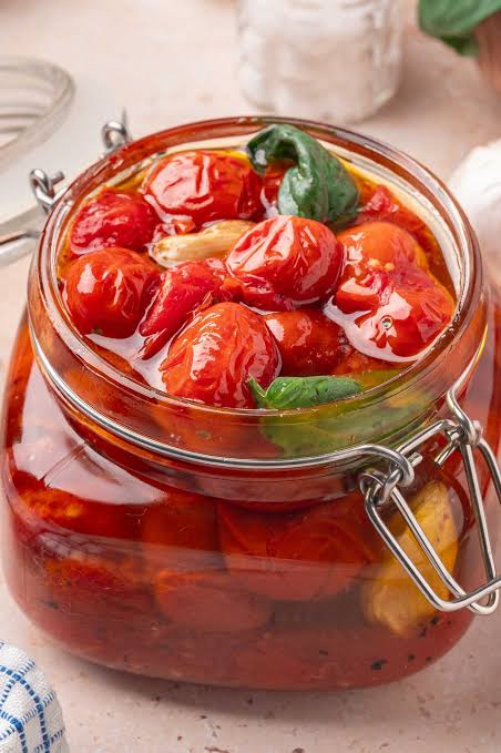 Canning cherry oil tomatoes